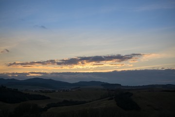 Obraz premium Sunset and sunrise with dramatic colorful clouds. Slovakia