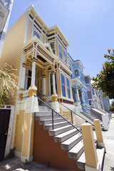 Stylish row of  colorful San Francisco neighborhood Victorians.