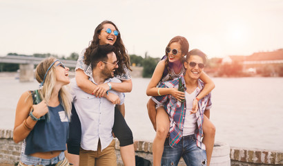 Happy young people attending festivals at summer