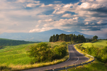 The asphalt road in the summer of Tuscany