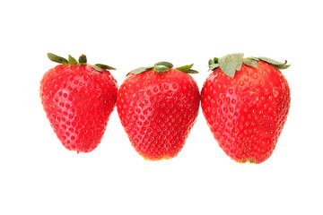 Three fresh red strawberry at row
