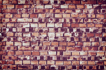 Burnt brick wall textured background