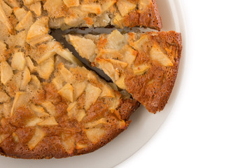 Apple pie isolated on a white background, top view, close up.