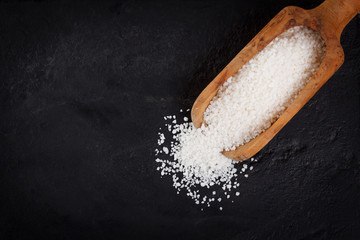 Granulated cassava (tapioca) on black background