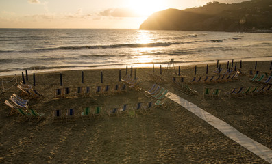 Obraz premium Scenic summer sunset over beach in Levanto, Italy