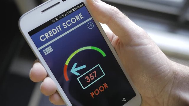 Credit score app on smartphone showing a bad credit history result to the user.