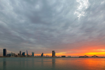 A beautiful view of Bahrain skyline during evening hours at sunset