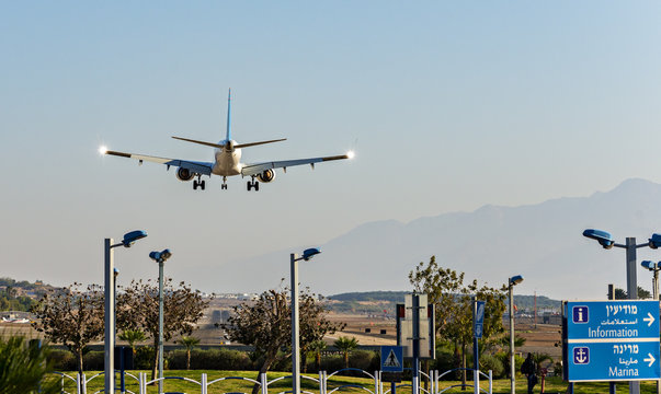 Landing airplane in airport of Eilat - famous resort city in Israel