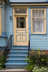Fototapeta premium Traditional architecture of a Victorian home in urban America.