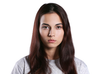 Fototapeta premium Depressed young woman on light background