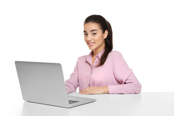 Beautiful young woman working with laptop, on white background