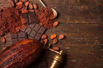 Dark chocolate on wooden table