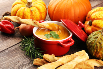 Pumpkin soup on a wooden table