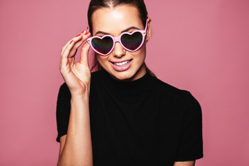Young woman posing with glasses