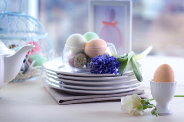 Beautiful Easter table setting  on linen tablecloth