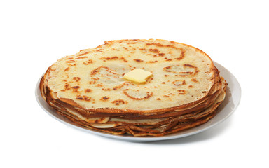 Pile of crepes on plate on white background
