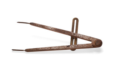 old rusty pair of dividers, tool isolated on white