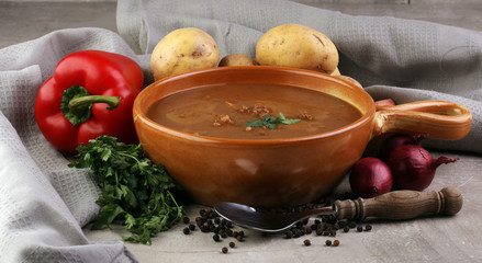 Tasty Hungarian beef goulash soup bograch close-up on the table and ingredient
