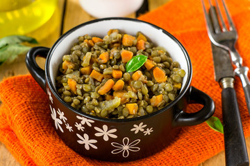 Lentil stew with carrots, celery and dried tomatoes