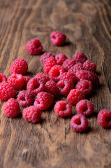 Berries raspberries on a wooden background. Concept of a healthy diet.