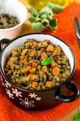 Lentil stew with carrots, celery and dried tomatoes
