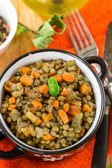 Lentil stew with carrots, celery and dried tomatoes