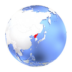North Korea on metallic globe isolated