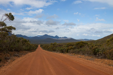 Fototapeta na wymiar Road through the Outback - Australia, Sterling Mountains