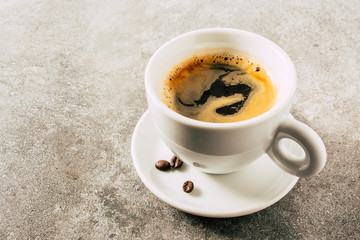 coffee cup on stone table