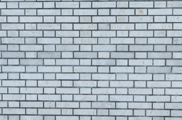 Grey brick wall for background and texture.