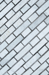 Grey brick wall for background and texture.