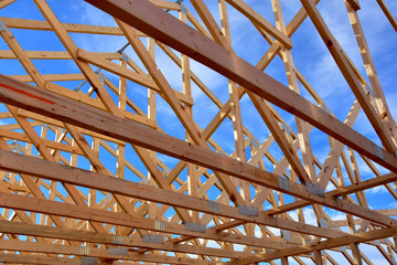 Wood framing members of new home under construction.