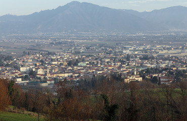 panorama of a small town in northern Italy with a background of