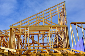 wood frame residential building under construction.