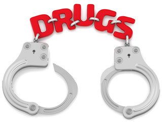 Detention for drugs. Steel handcuffs with red word 