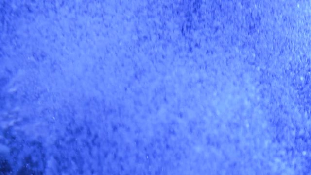 Bubbles in the water. Oxygen in the water bubble. Water background texture H20. The water boils.