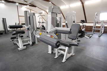 Fototapeta na wymiar Fitness hall with fitness machines