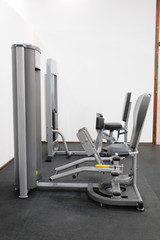Fototapeta na wymiar Fitness hall with fitness machines