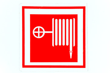 Extinguishing a fire hose symbol