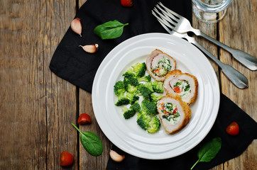 Ricotta tomato spinach stuffed turkey with broccoli