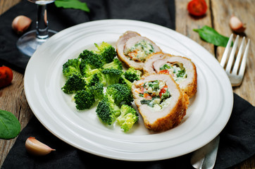 Ricotta tomato spinach stuffed turkey with broccoli