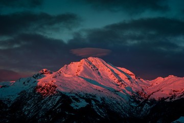 snowy mountain at sunset