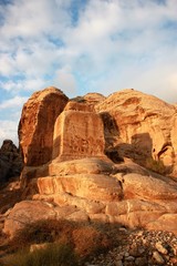 Djin blocks and Bab as Siq in ancient nabatean city of Petra in Jordan, Middle East