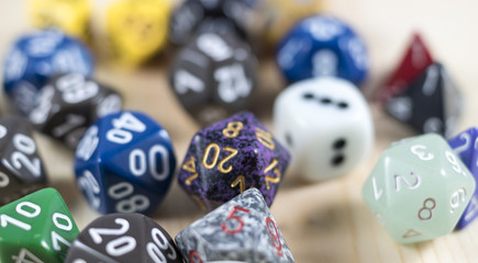 Gaming dice on wood