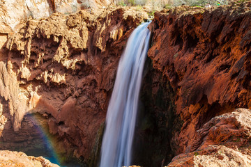  This is Havasu Falls on the Havasupai Reservation in Supai, Arizona. The falls have beautiful blue green flowing water, and this area is world famous.