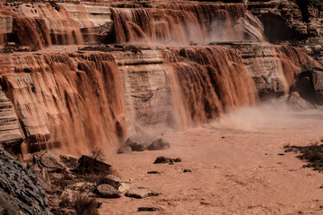 Grand Falls(Chocolate Falls) northeast of Flagstaff, AZ is located on the Navajo Reservation, and...