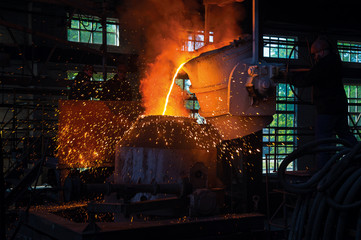 pouring steel into the converting furnace