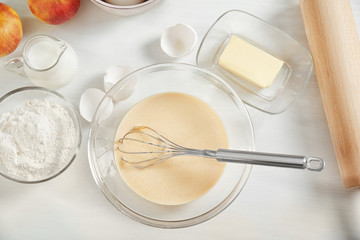 Fototapeta na wymiar Ingredients for making pie on kitchen table