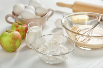 Fototapeta na wymiar Ingredients for making pie on kitchen table