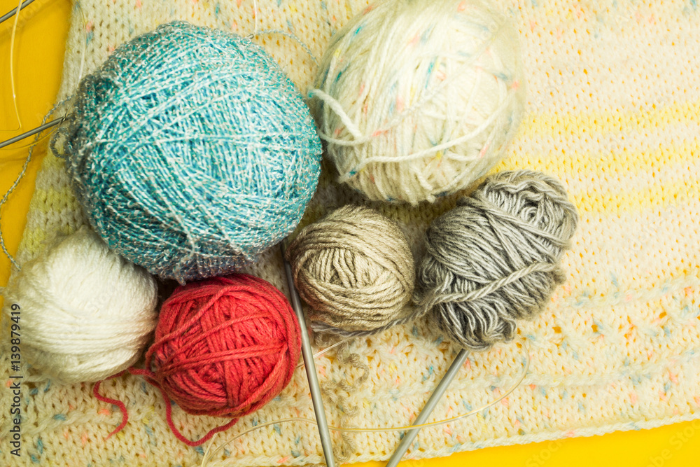 Poster multicolored tangles with yarn and threads on a yellow background. handmade.